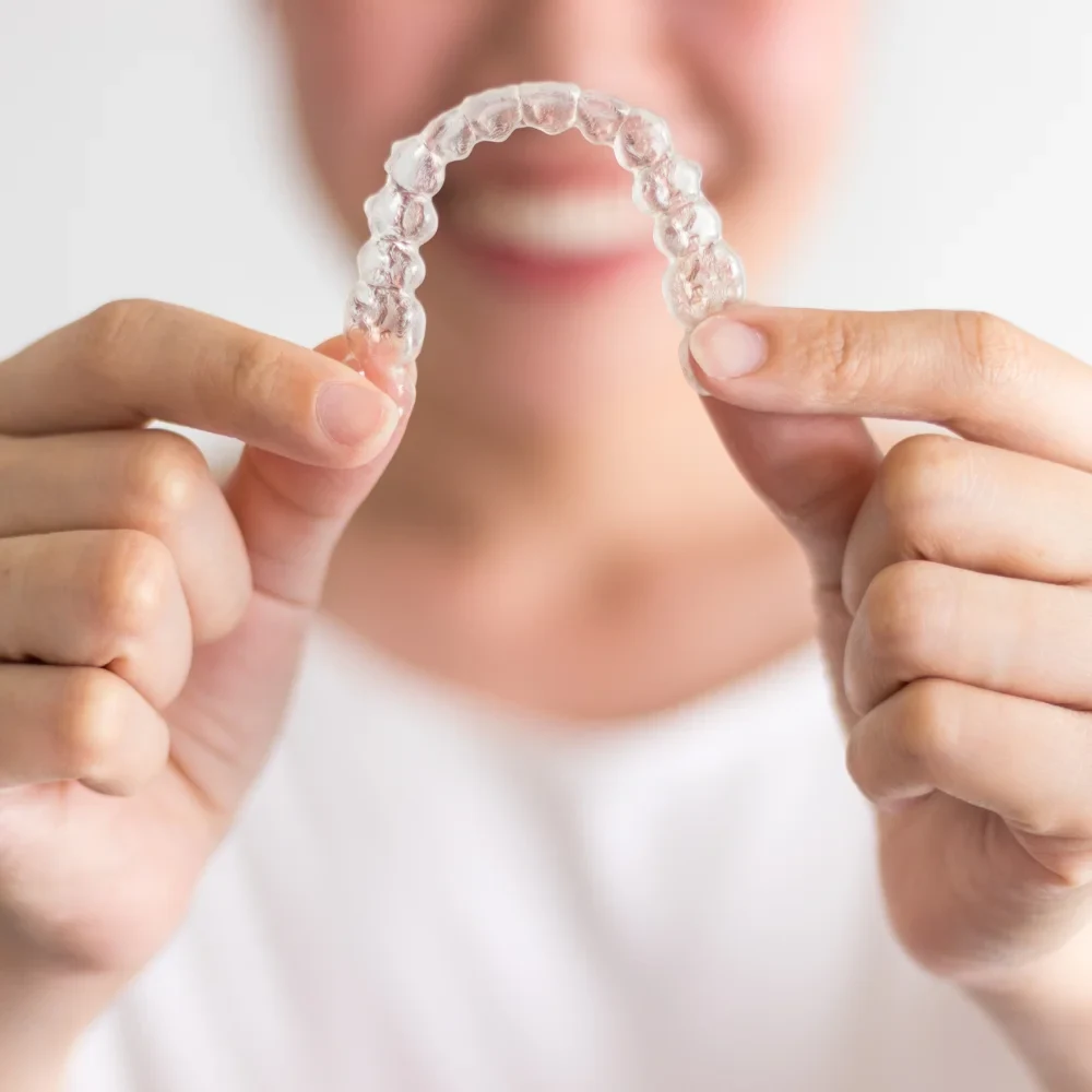Clear Invisalign aligners used for teeth straightening treatment