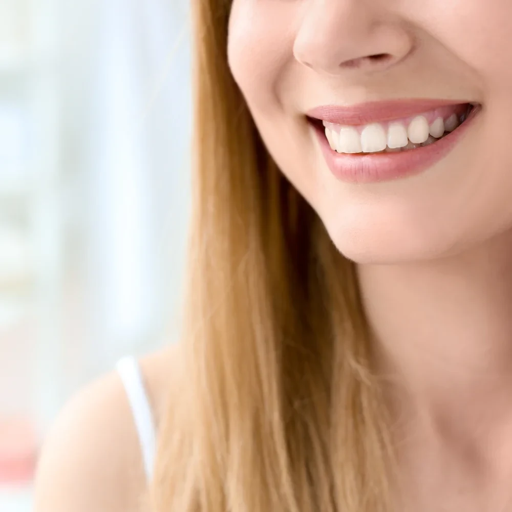 Close-up of straight, healthy teeth with a natural smile