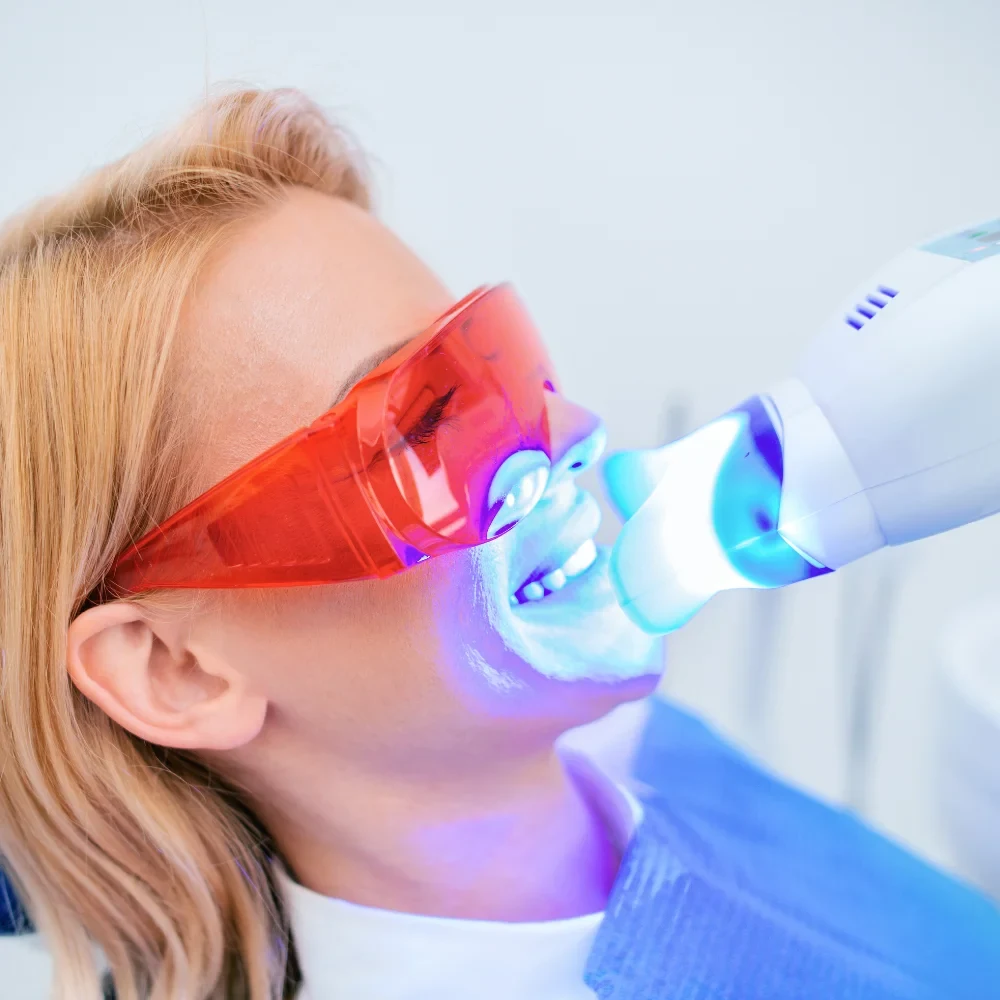 Zoom teeth whitening treatment using LED light in a dental clinic