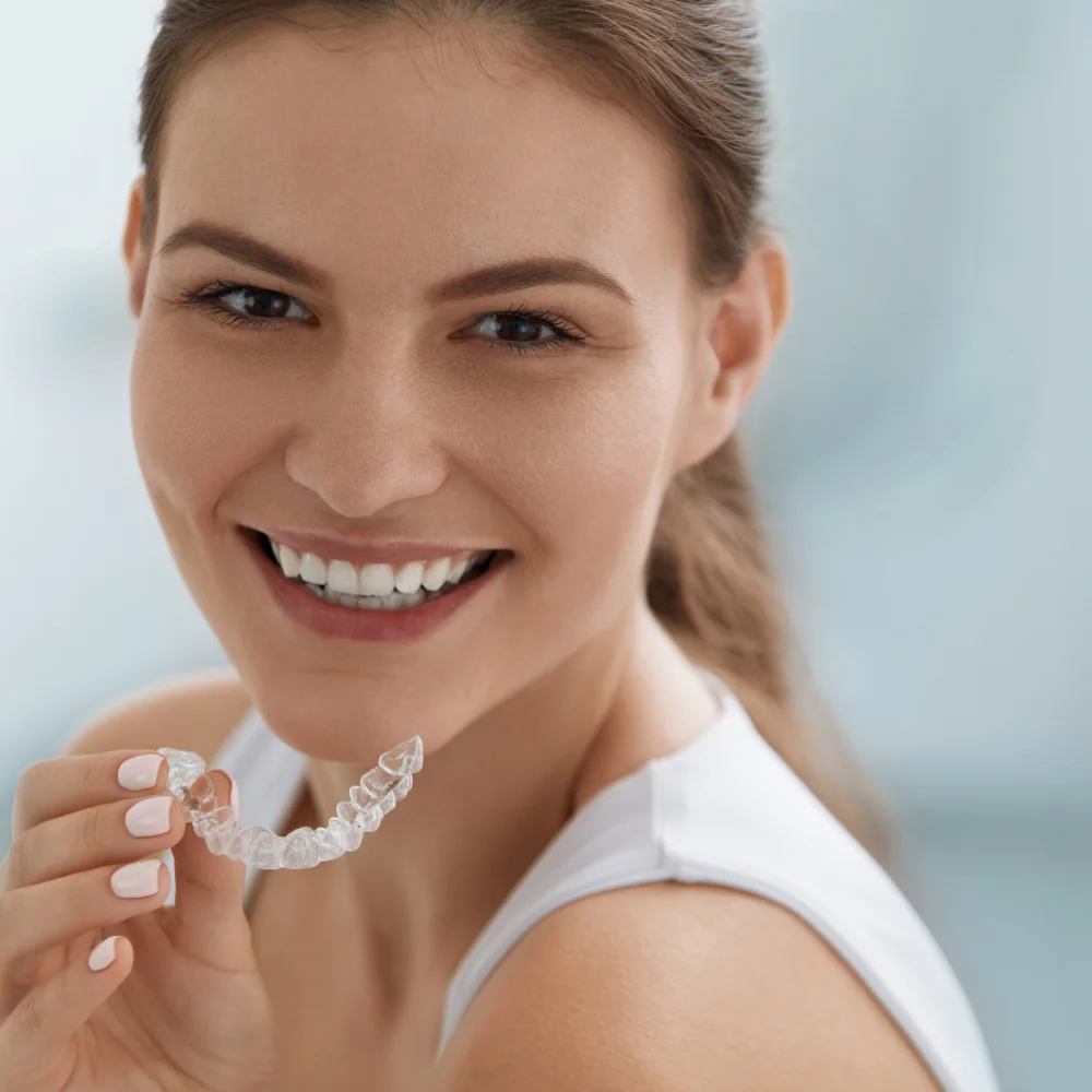 Retainer used after Invisalign treatment to maintain straight teeth